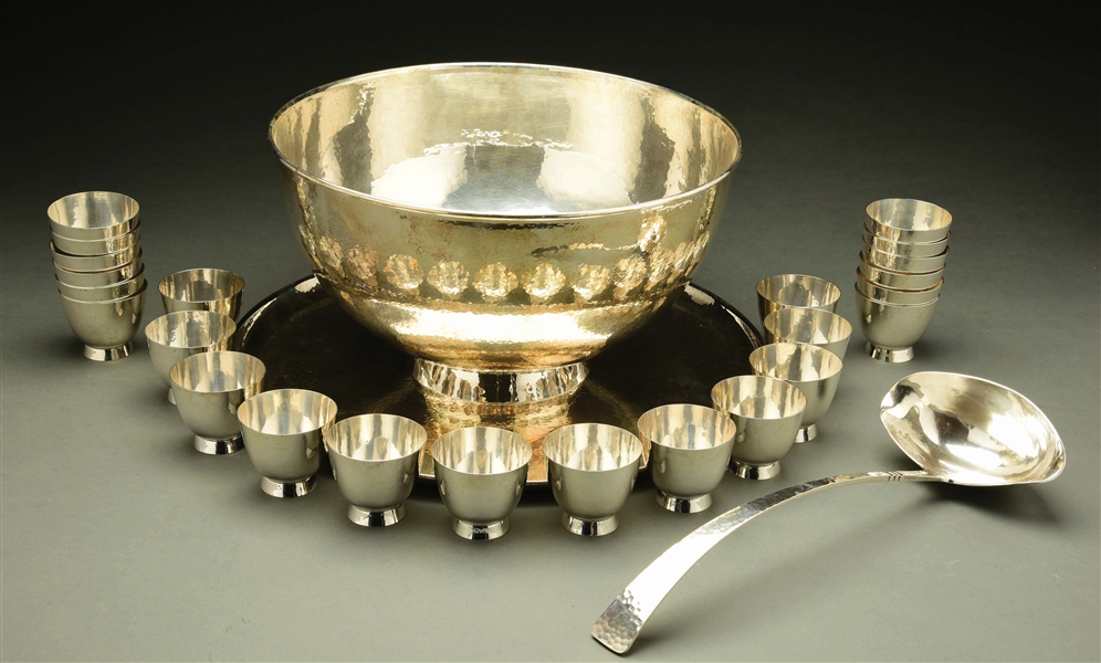 AN AMERICAN STERLING PUNCH SET.