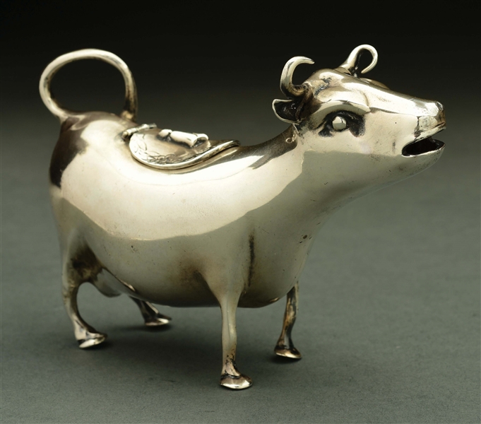 A STERLING COW CREAMER.