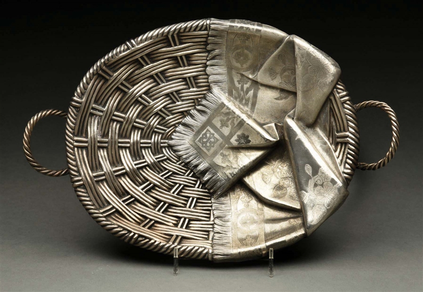A RUSSIAN SILVER BISCUIT BOWL.