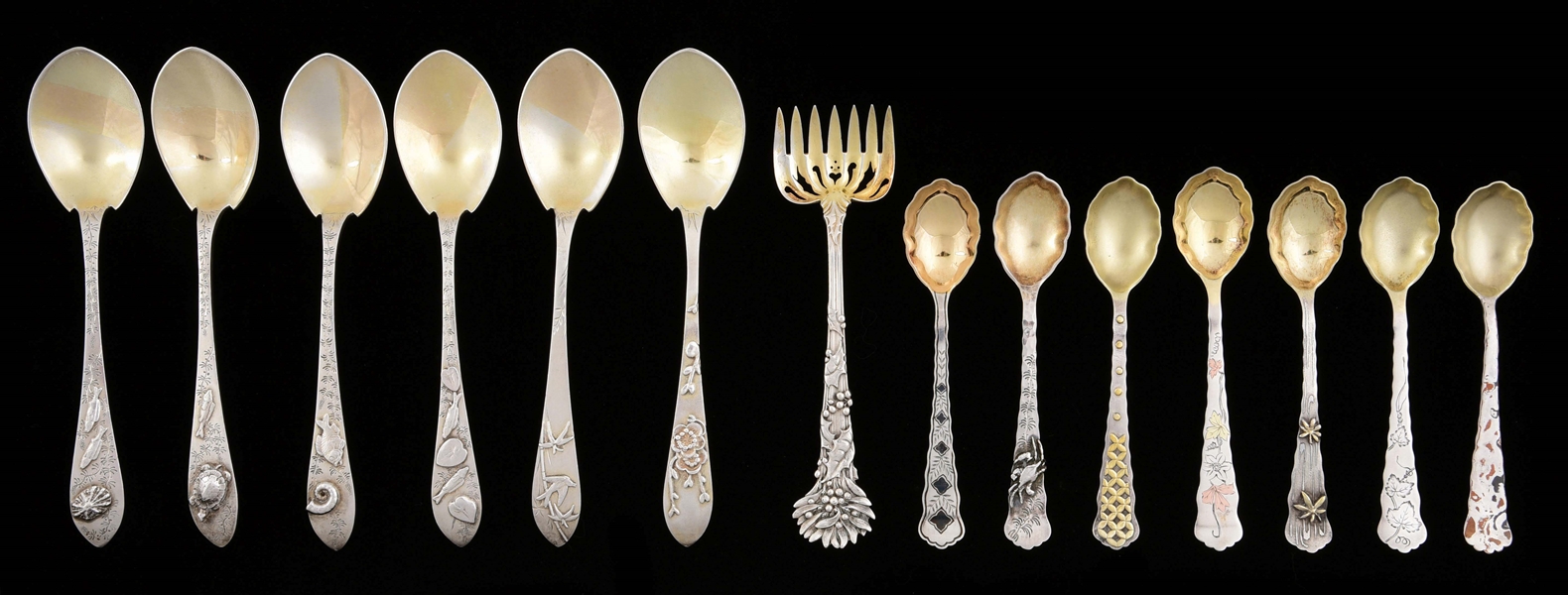 TWO SETS OF TIFFANY STERLING SPOONS.