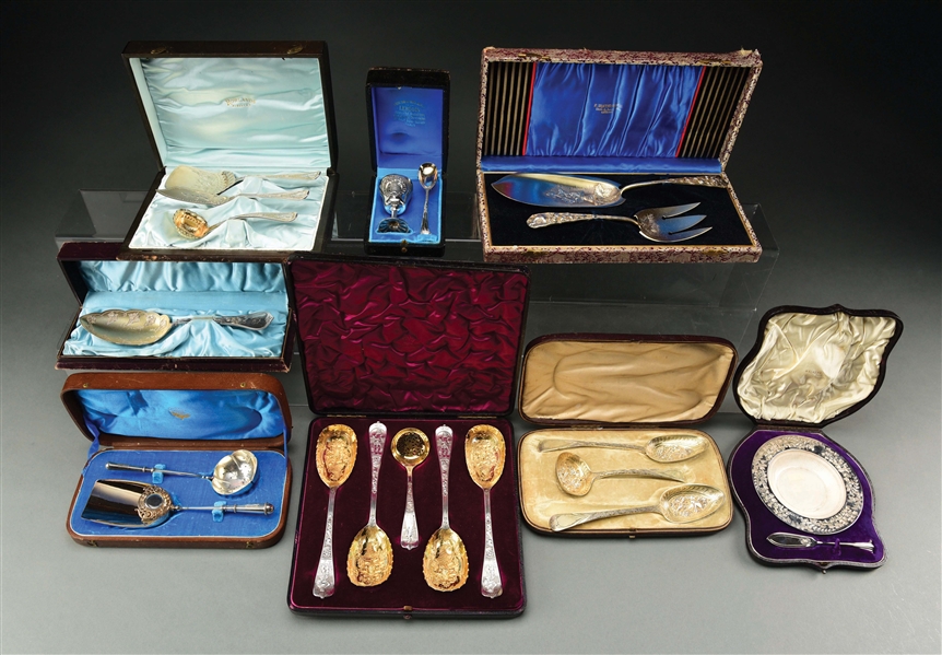 A GROUP OF CASED SILVER SETS.