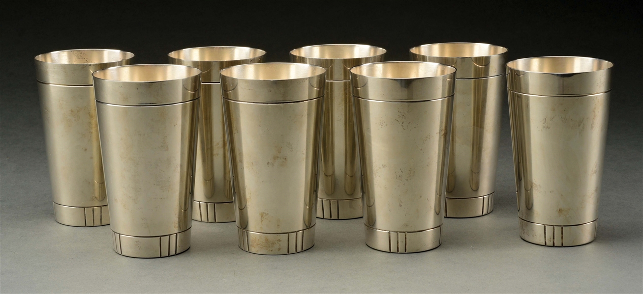 A GROUP OF EIGHT GORHAM STERLING BEAKERS.