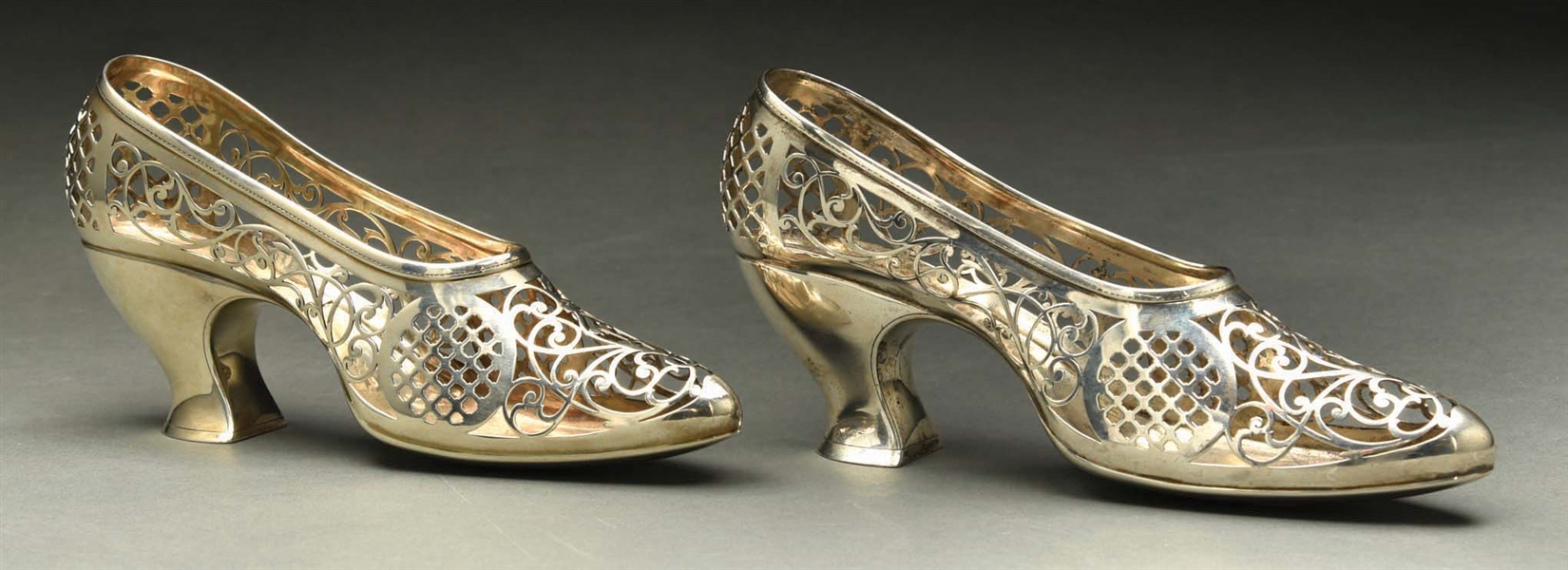 A PAIR OF GORHAM STERLING POTPOURRI SHOES.