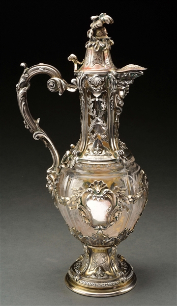 A FRENCH SILVER MOUNTED CLARET JUG.