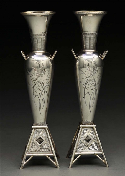A PAIR OF WHITING STERLING VASES.