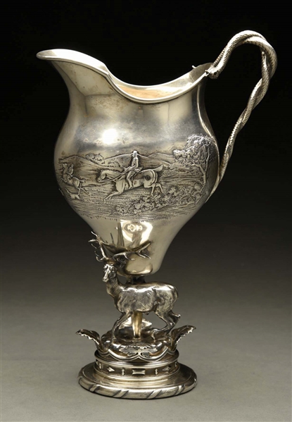 AN ENGLISH SILVER TROPHY PITCHER.