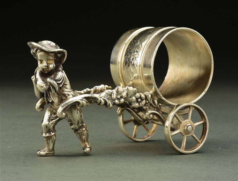 BOY WITH CART NAPKIN RING.