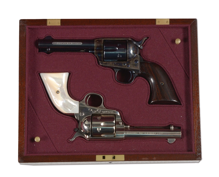 (A) CASED PAIR OF ANTIQUE COLT FRONTIER SIX SHOOTER SINGLE ACTION REVOLVERS.