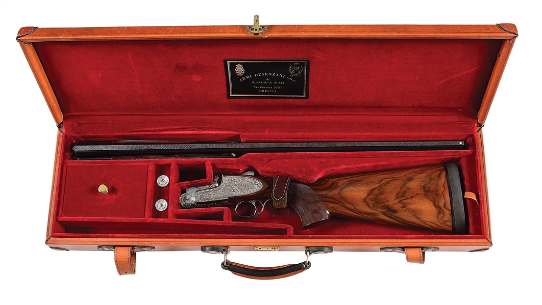 (M) INCREDIBLY FINE DESENZANI OVER-UNDER SIDELOCK EJECTOR SINGLE TRIGGER GAME GUN ENGRAVED BY PARRAVICINI AND FINISHED BY GUSSAGO, WITH CASE.