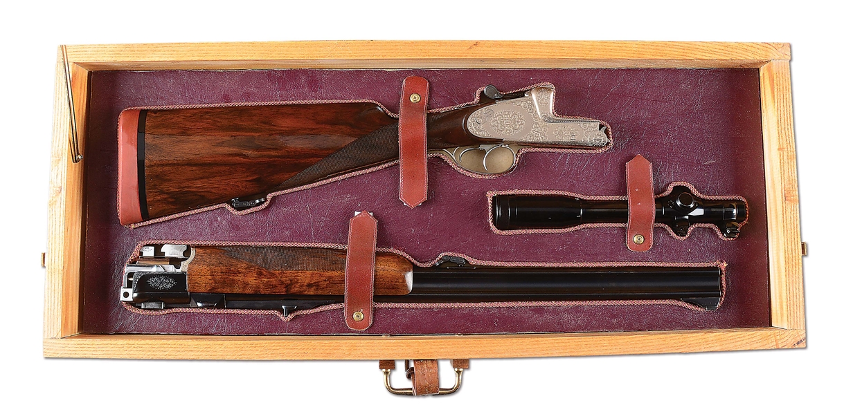 (M) UNUSUAL KRIEGHOFF ULM PRIMUS SIDELOCK EJECTOR OVER UNDER DOUBLE RIFLE HAVING STRAIGHT STOCK WITH SCOPE AND CASE.