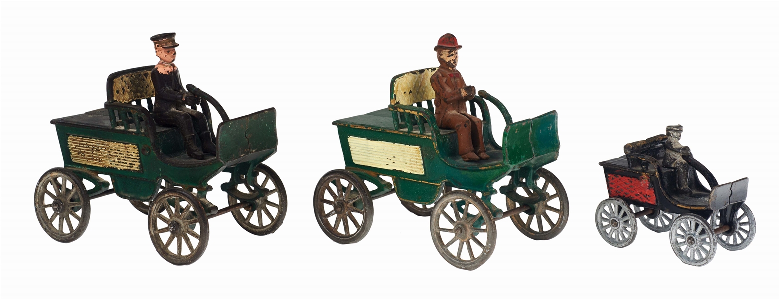 LOT OF THREE CAST IRON HARRIS HORSELESS CARRIAGES.