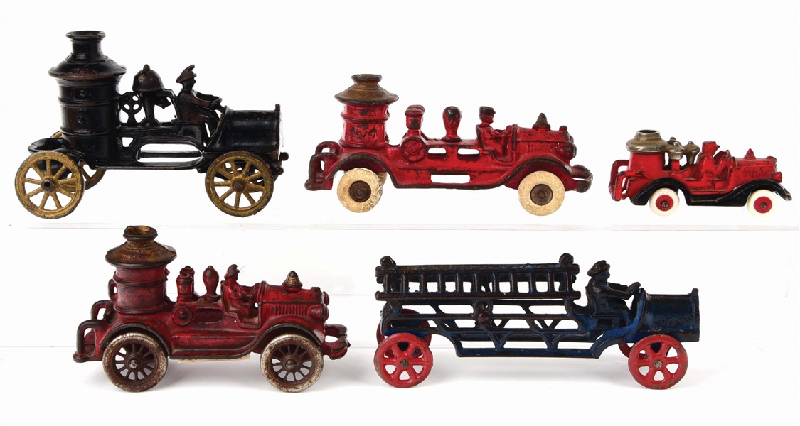 LOT OF 5: AMERICAN MADE CAST-IRON FIRE PUMPER AND LADDER TRUCKS.