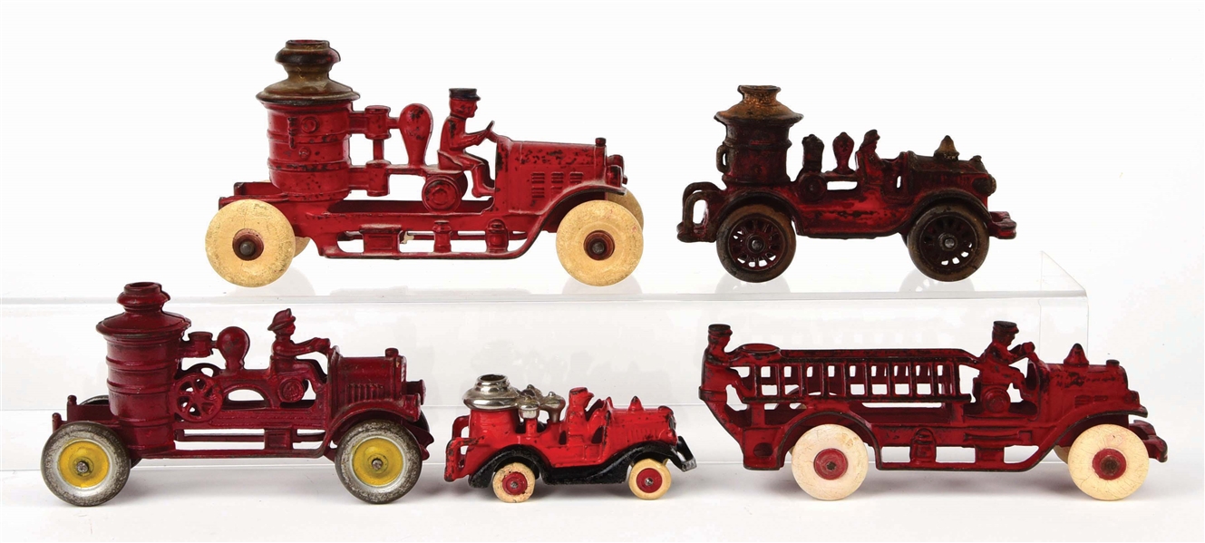 LOT OF 5: AMERICAN MADE CAST-IRON FIRE PUMPER AND LADDER TRUCKS. 