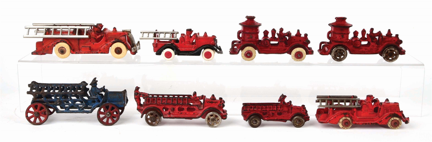 LOT OF 8: CAST-IRON AMERICAN MADE FIRE LADDER AND PUMPER TRUCKS. 