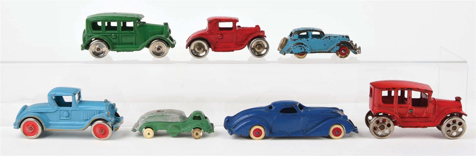 LOT OF 7: CAST-IRON AMERICAN MADE AUTOMOBILE TOYS.