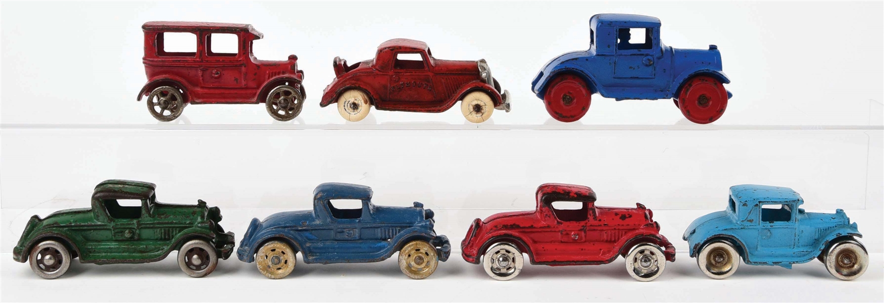 LOT OF 7: CAST-IRON AMERICAN MADE AUTOMOBILES.