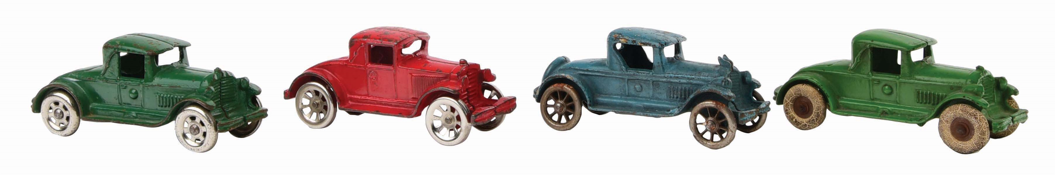 LOT OF 4: CAST-IRON AMERICAN MADE VEHICLE TOYS.