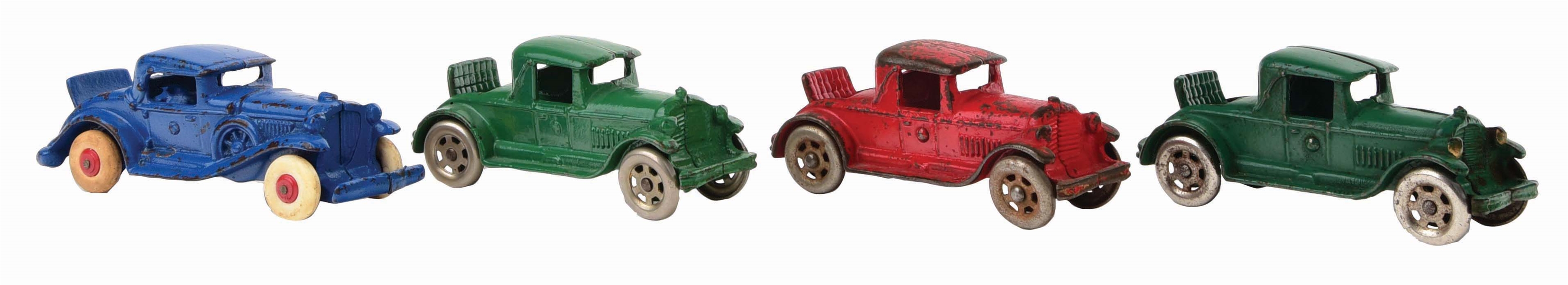 LOT OF 4: AMERICAN MADE CAST-IRON AUTOMOBILES.