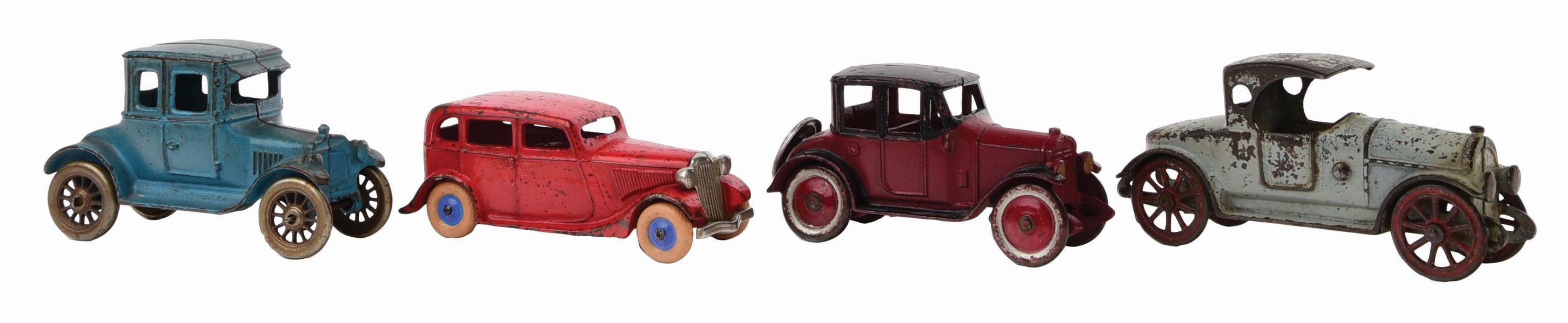 LOT OF 4: AMERICAN MADE CAST-IRON AUTOMOBILES.
