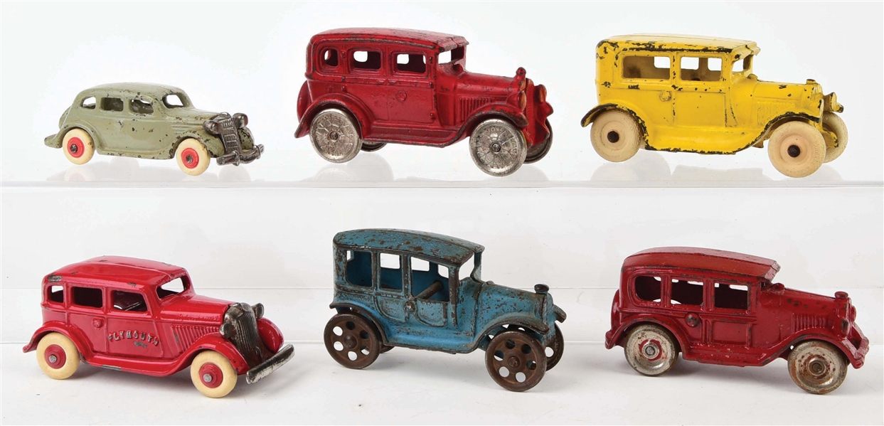 LOT OF 6: AMERICAN MADE CAST-IRON VEHICLES.