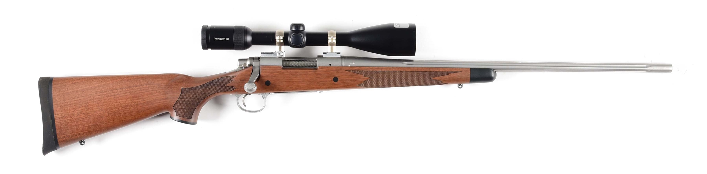 (M) REMINGTON 700 LIMITED BOLT ACTION RIFLE WITH SCOPE.