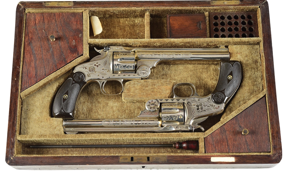 (A) CASED PAIR OF CUSTOM ENGRAVED SMITH & WESSON NUMBER 3 .32-44 REVOLVERS.