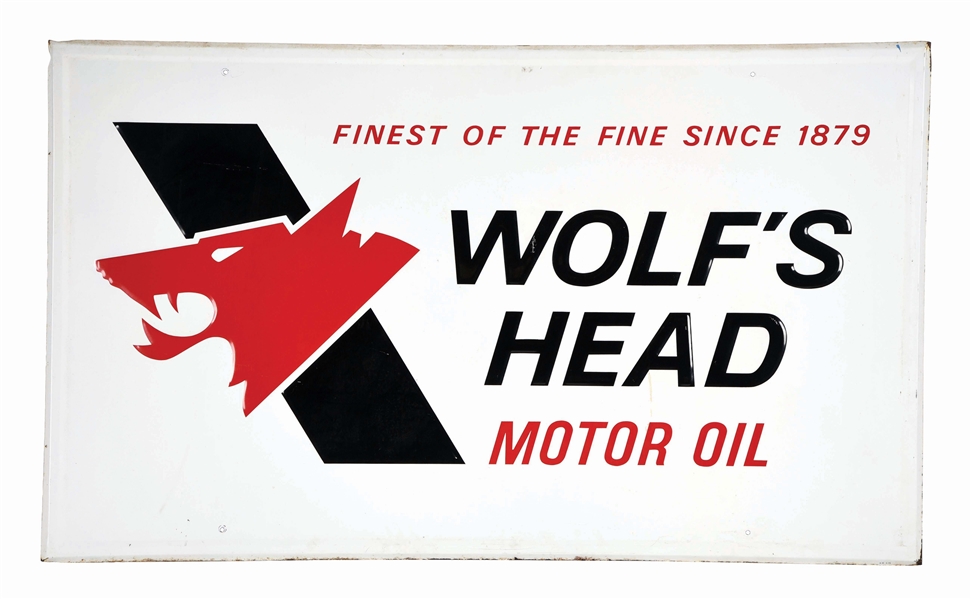 WOLFS HEAD MOTOR OIL EMBOSSED TIN SERVICE STATION SIGN.