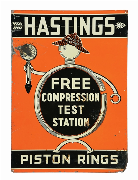 HASTINGS PISTON RINGS EMBOSSED TIN SERVICE STATION SIGN.