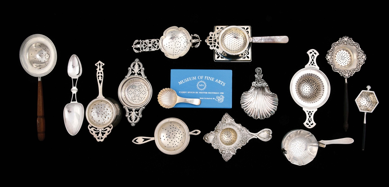 A GROUP OF STERLING TEA STRAINERS.