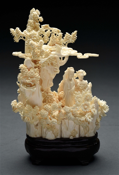 CARVED IVORY FLORAL AND FIGURAL PIECE.