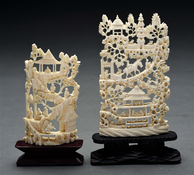 PAIR OF CARVED IVORY SHADES.