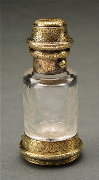 AN ENGLISH SILVER GILT MOUNTED SCENT BOTTLE AND VINAIGRETTE.