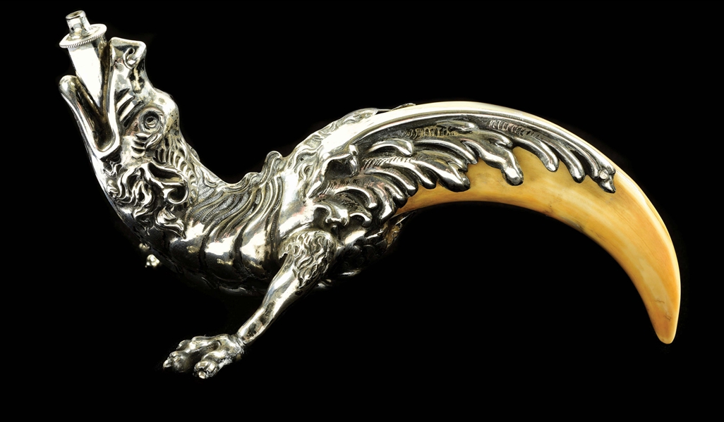 STERLING SILVER FUGH DRAGON CIGAR LIGHTER WITH BEARS TOOTH. 