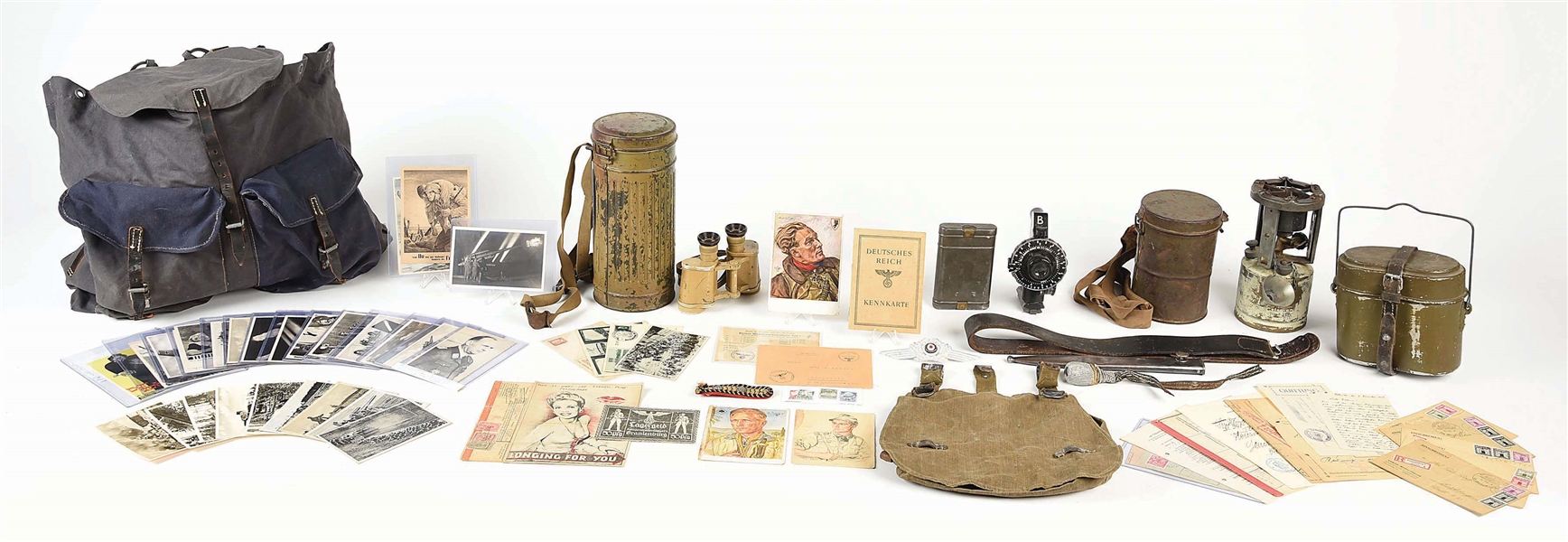 LOT OF GERMAN WWII MILITARY FIELD GEAR ANS MISCELLANEOUS PAPER ITEMS.