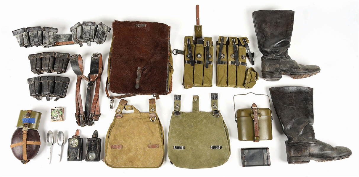 LOT OF WORLD WAR II GERMAN MILITARY GEAR AND BOOTS.
