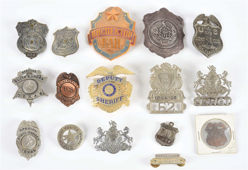 LOT OF 16: POLICE BADGES. 