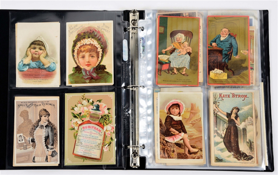 ALBUM OF 110 VINTAGE TRADE CARDS.