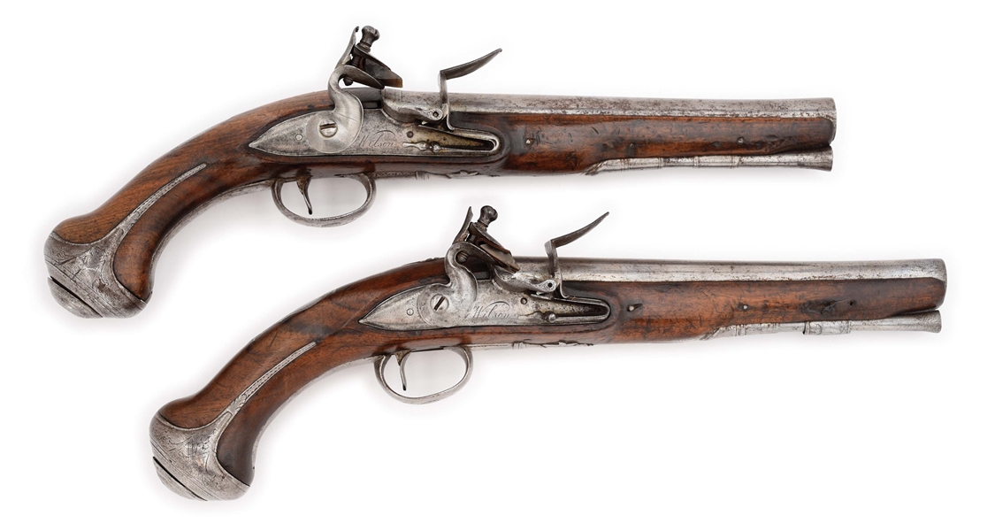 (A) PAIR OF ENGLISH IRON MOUNTED FLINTLOCK OFFICERS PISTOLS BY WILSON.