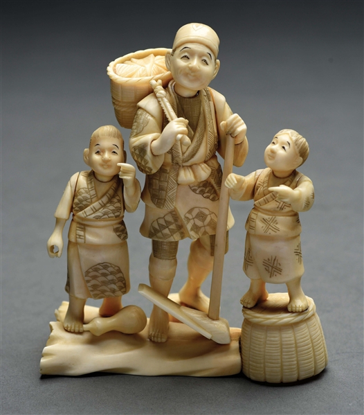 IVORY CARVED FIGURAL GROUP.
