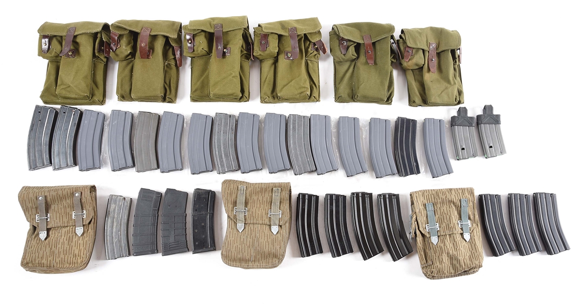 LARGE LOT OF AR-15 MAGAZINES AND POUCHES.