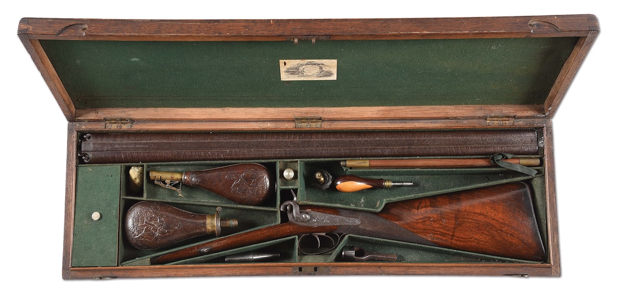 (A) ALEXANDER THOMSON PERCUSSION 11 GAUGE SHOTGUN IN CASE WITH ACCESSORIES.