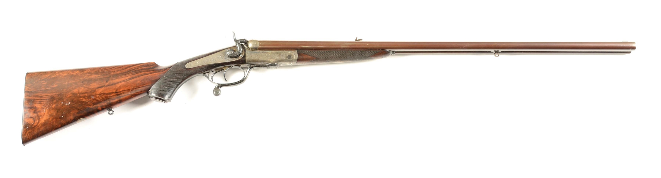 (A) PURDEY HAMMER FIRED DOUBLE RIFLE IN AN UNKNOWN .450 CARTRIDGE (1879).