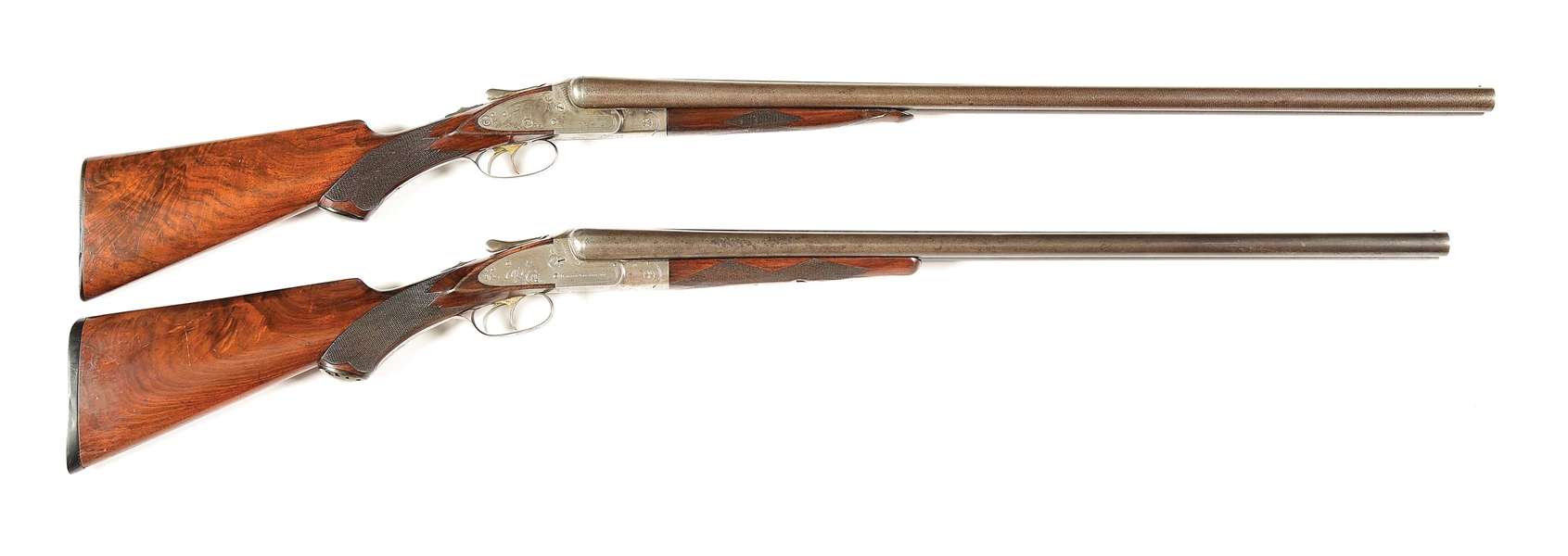 (C) LOT OF TWO: MERIDEN 55 AND 56 SIDE BY SIDE 12 GAUGE SHOTGUNS.