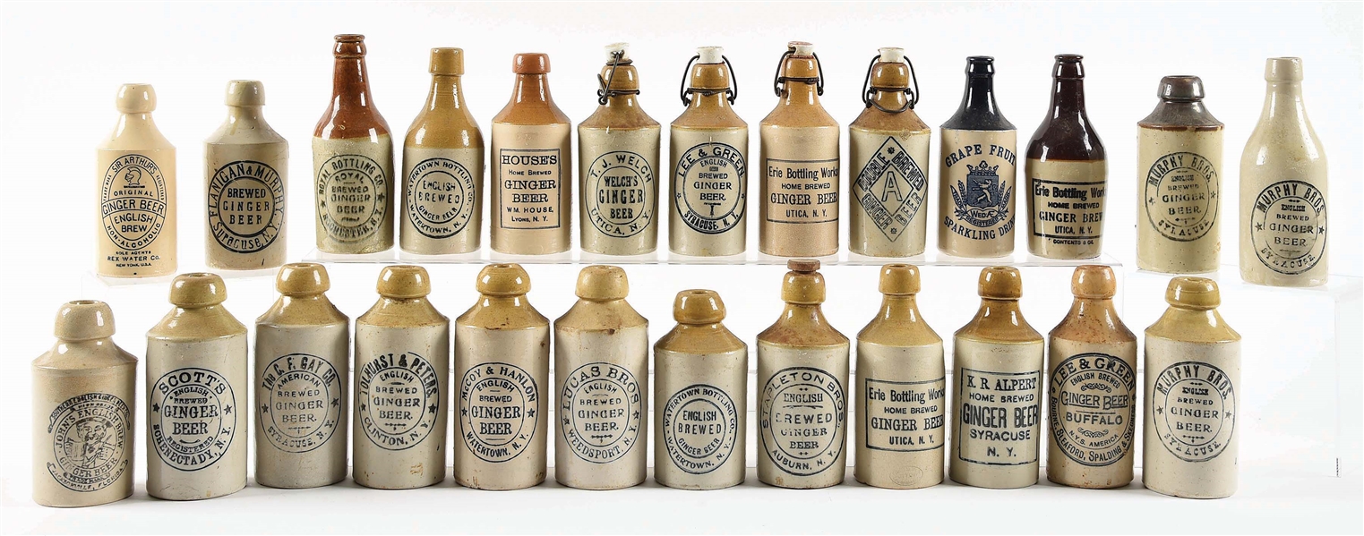 INSTANT COLLECTION OF 25 GINGER BEER STONEWARE BOTTLES FROM THE STATE OF NEW YORK.