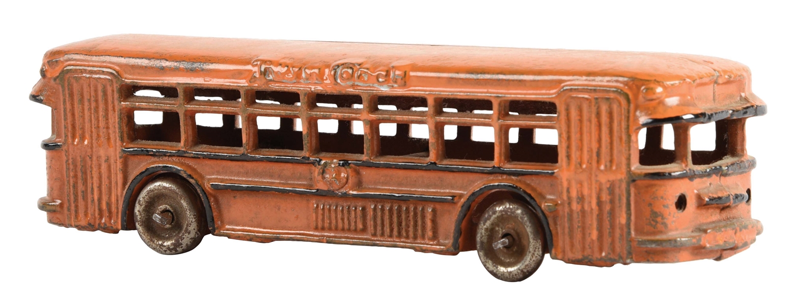 CAST-IRON A.C. WILLIAMS TWIN COACH TOY BUS.