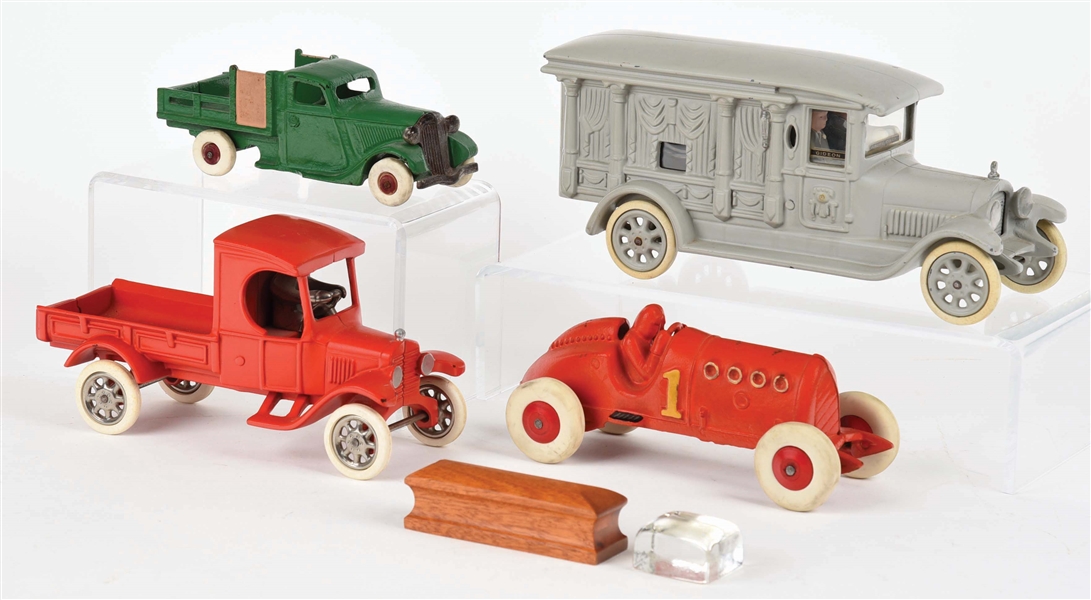 LOT OF 4: CONTEMPORARY CAST-IRON VEHICLE TOYS.