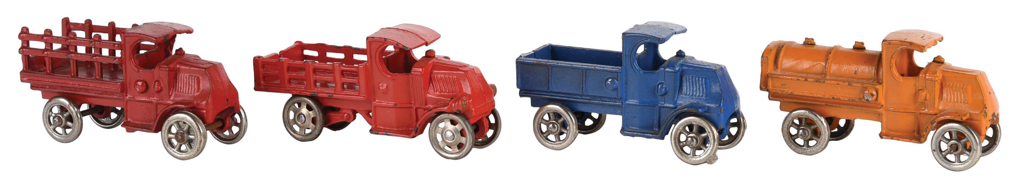 LOT OF 4: AMERICAN MADE CAST-IRON MACK FRONT TRUCK TOYS.