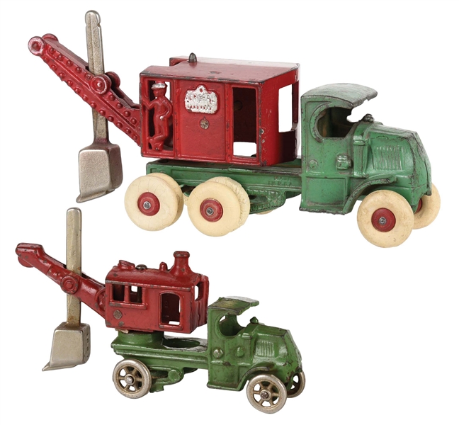 LOT OF 2: CAST-IRON AMERICAN MADE STEAM SHOVEL TOY TRUCKS.