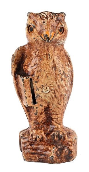 OWL WITH SLOT IN BOOK BANK.