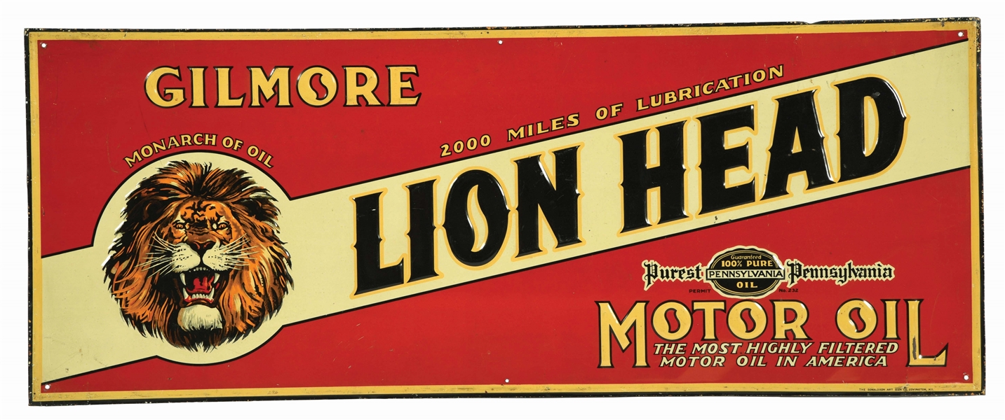 GILMORE LION HEAD MOTOR OIL EMBOSSED TIN SERVICE STATION SIGN W/ LION GRAPHIC.